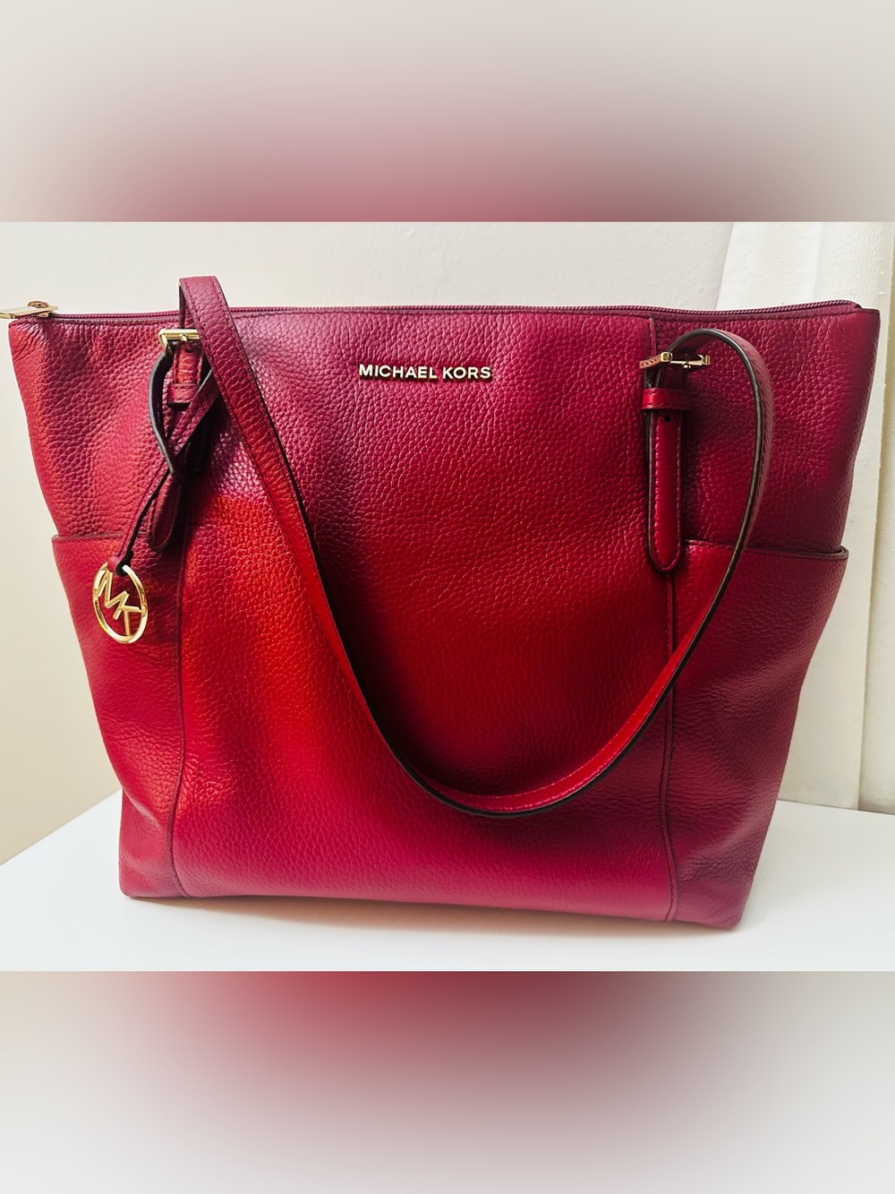 Michael Kors “Jet Set” Raspberry colored pebbled leather tote bag & MK charm